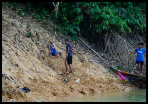 Swinging on a rope into the lake